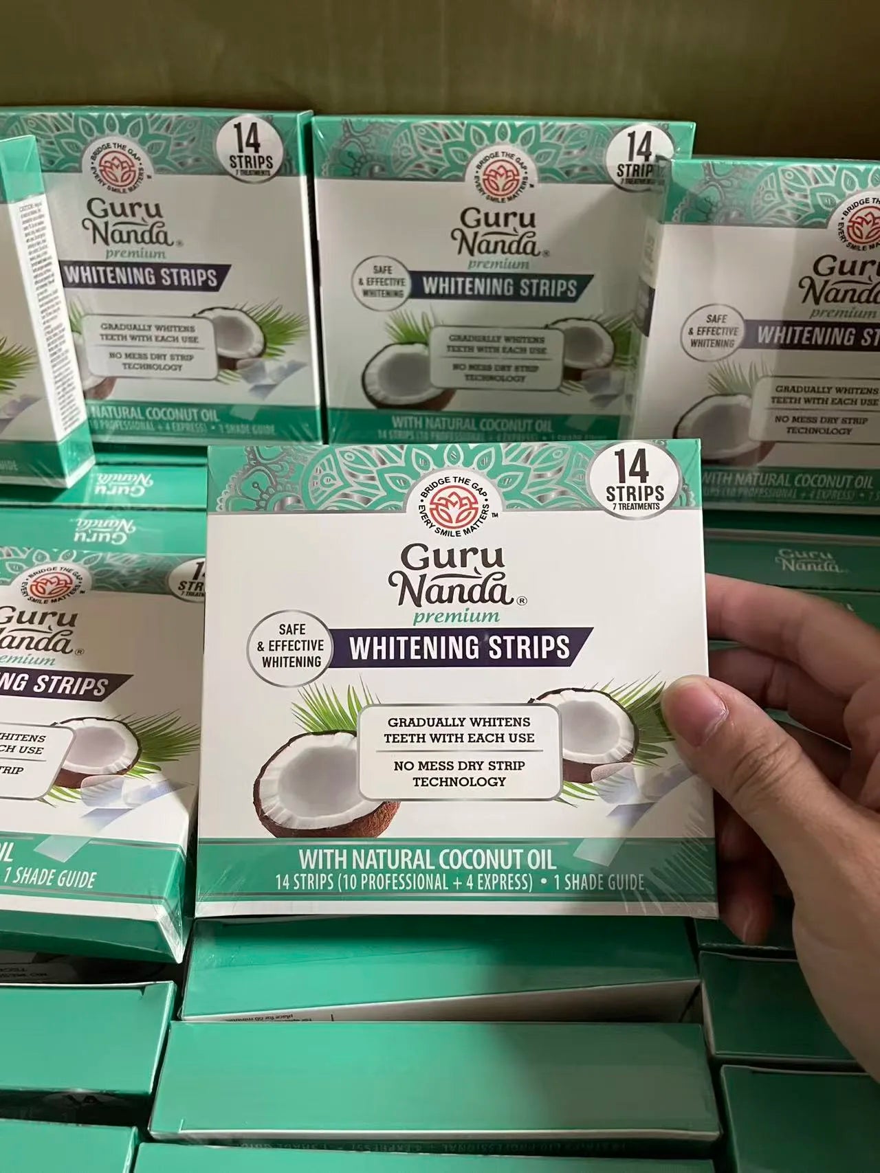 Experience Brilliant Smiles with Guru Nanda's Coconut Oil Teeth Whitening Strips - Factory Direct!